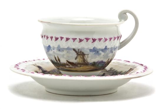 *A Meissen Porcelain Cup and Saucer