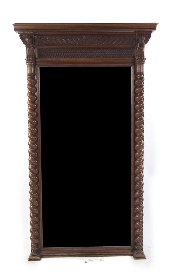 A Jacobean Mahogany Mirror having