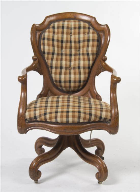 *A Victorian Desk Chair the shield