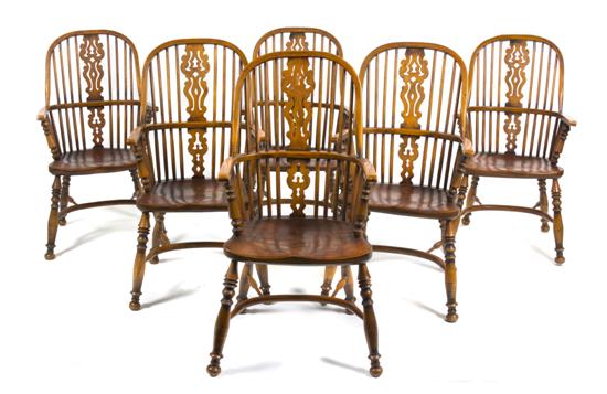 A Set of Six Windsor Armchairs the rounded