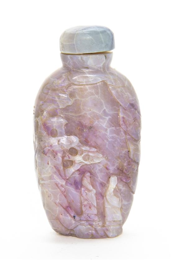 A Carved Opal Snuff Bottle of compressed 151359