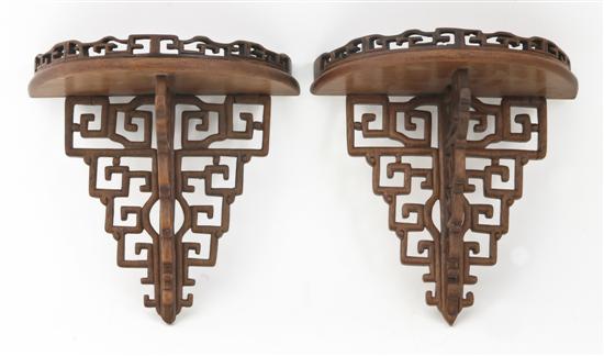 *A Pair of Chinese Carved Hardwood