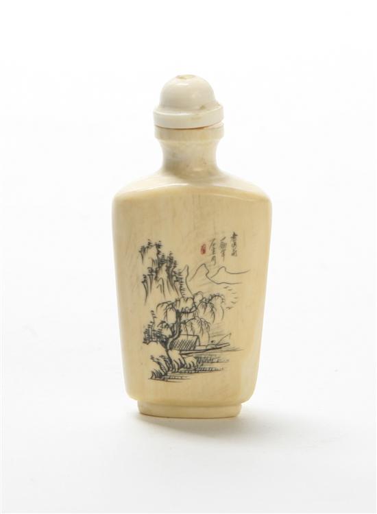 An Ivory Snuff Bottle depicting a landscape.