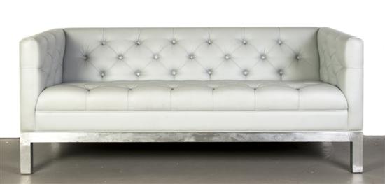 A Leather Upholstered Settee the