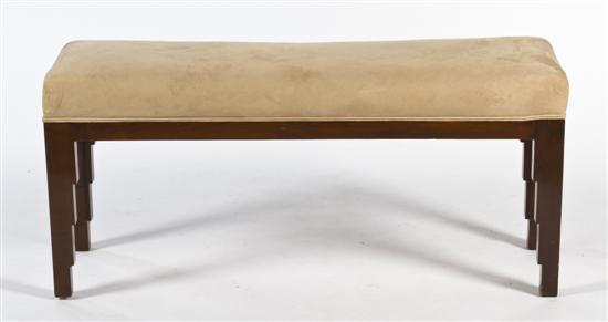 An Art Deco Mahogany Bench having