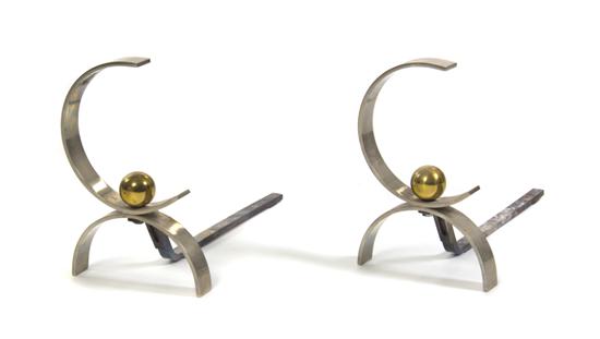 A Pair of Steel Andirons having