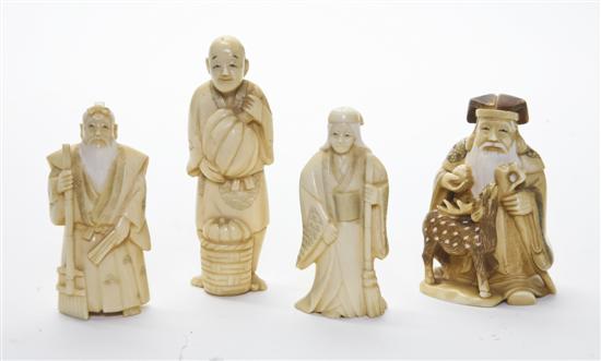 A Collection of Four Asian Carved 151586