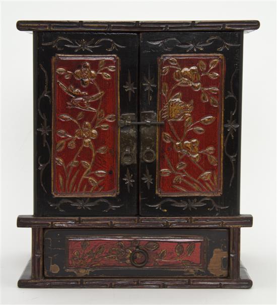 A Chinese Lacquered Table Cabinet