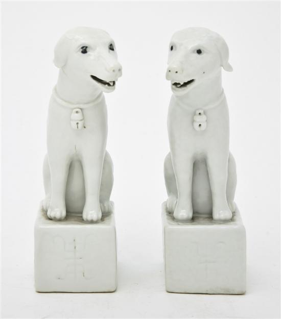 A Pair of Chinese Blanc de Chine Dogs