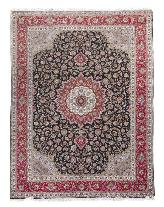 A Persian Wool Carpet having a 151631