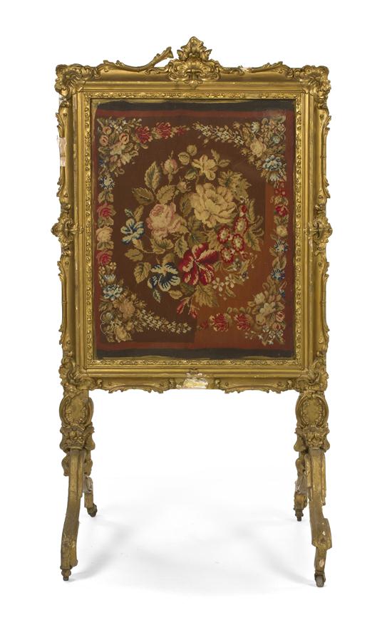 A Louis XV Style Giltwood Firescreen