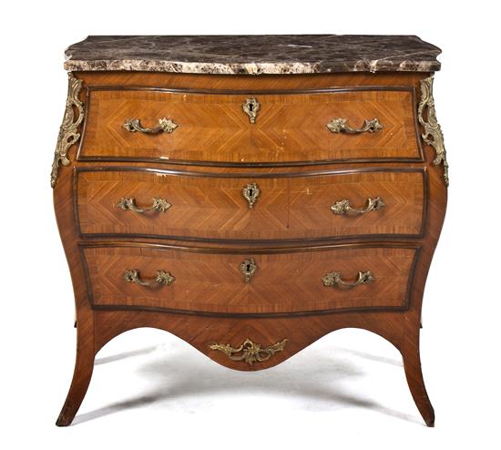 A Louis XV Style Bombe Form Commode