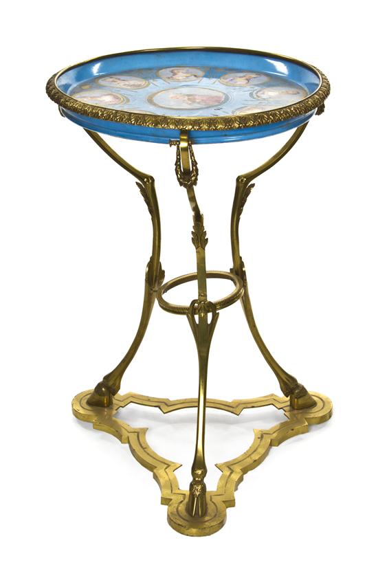A Sevres Style Porcelain and Gilt Bronze