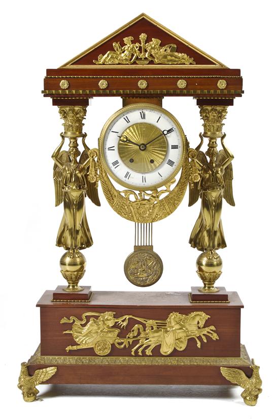 An Empire Gilt Bronze Mounted Mahogany