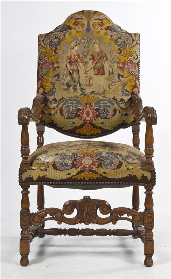 A Henry II Style Open Armchair having