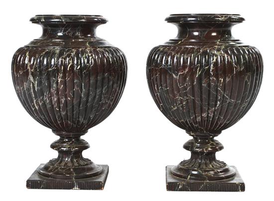 A Pair of Faux Marble Carved Wood