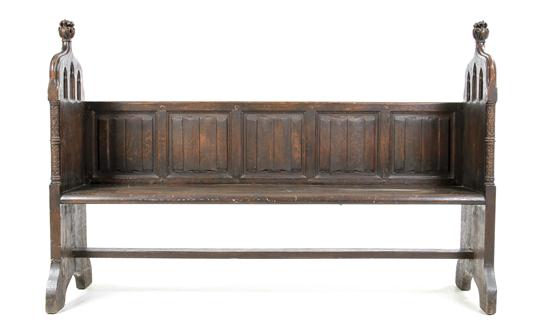 A Gothic Revival Carved Oak Bench