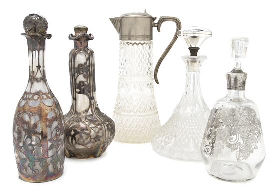Three Silver Overlay Decanters together