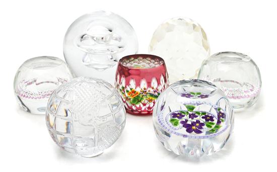 A Collection of Seven Glass Paperweights