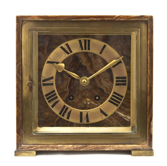 A French Onyx Cased Mantel Clock retailed