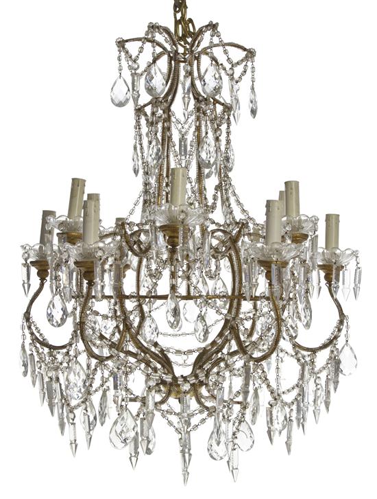 A Continental Twelve Light Chandelier 151aa9