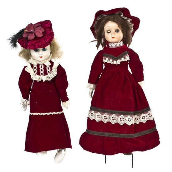 Two Bisque Head Dolls each in velvet