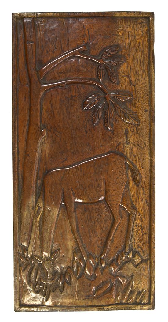 A Carved Wood Relief Plaque depicting