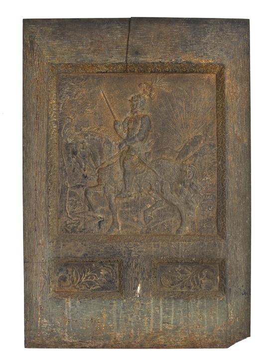 A Cast Metal Relief Plaque depicting