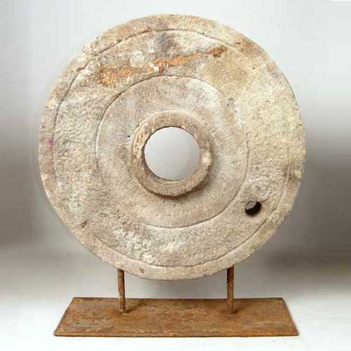 A Stone Grinding Wheel on Stand 19th