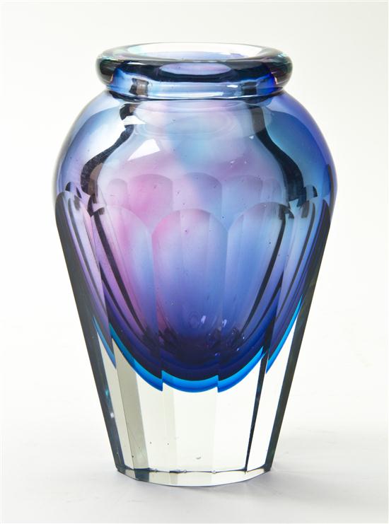A Faceted Glass Vase of tapering