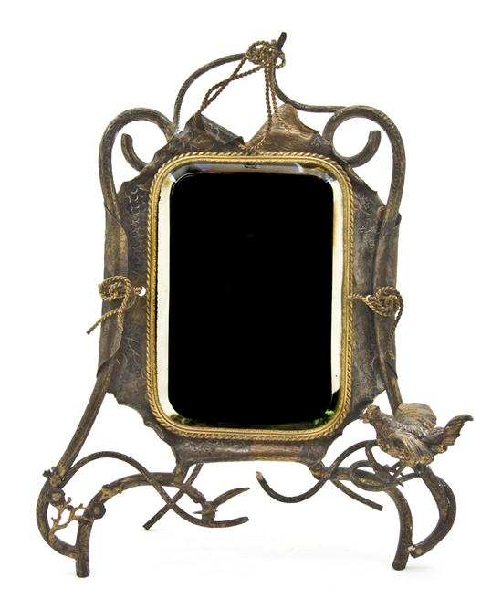 *A Cast Metal Dressing Mirror having