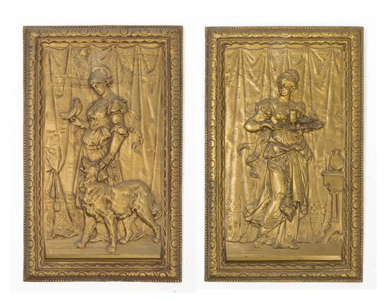 A Pair of Gilt Metal Wall Plaques