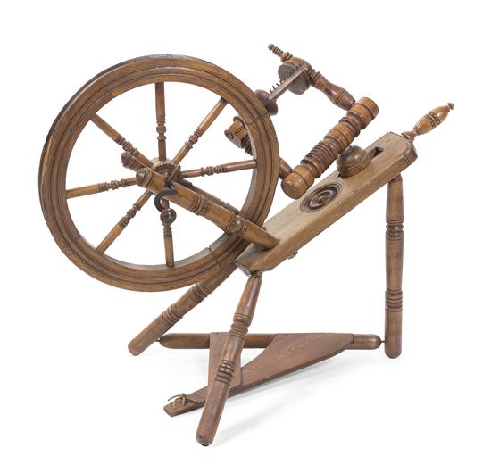 An American Spinning Wheel of typical
