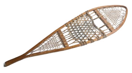 A Bentwood and Hide Snow Shoe of 154948