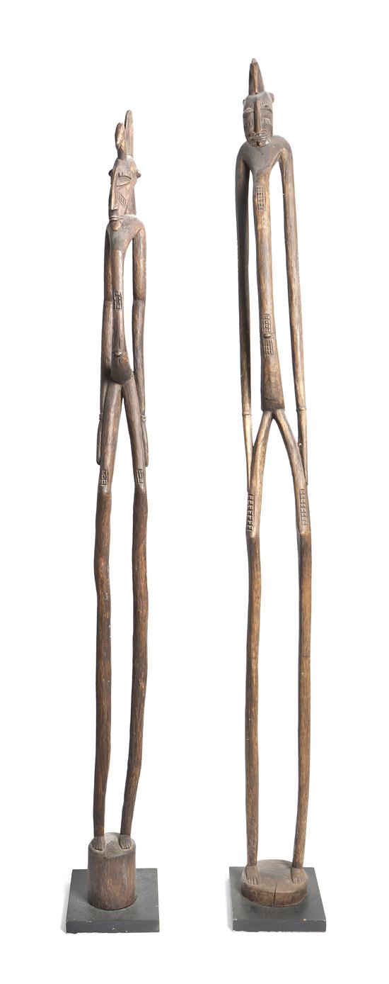 *Two Senufo Carved Wood Rhythm Pounders