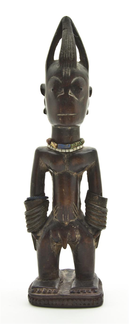 A Yoruba Carved Wooden Figure early