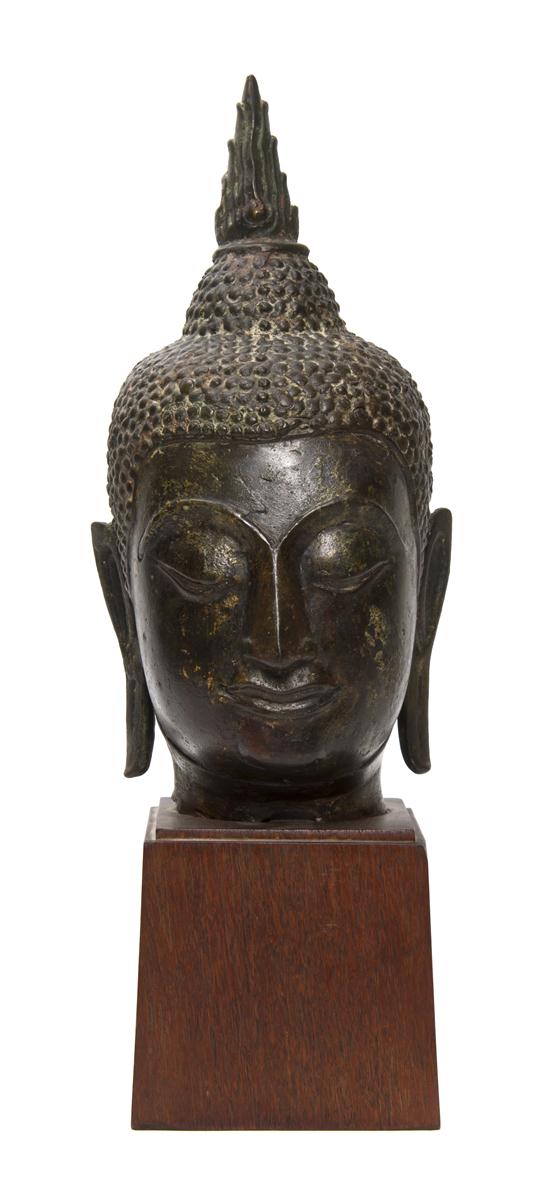 *A Bronze Model of the Head of Buddha
