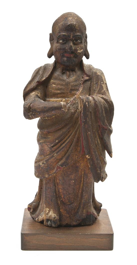 A Chinese Gesso and Wood Statue depicting