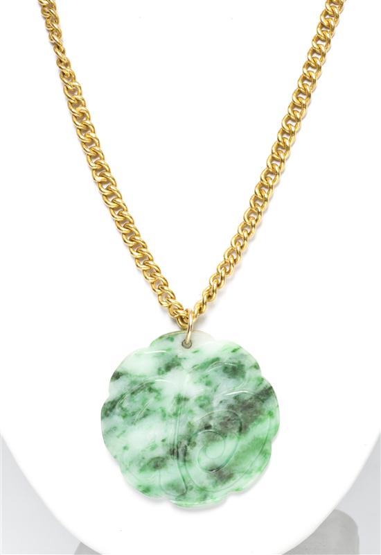 A 22 Karat Yellow Gold and Jade Pendant