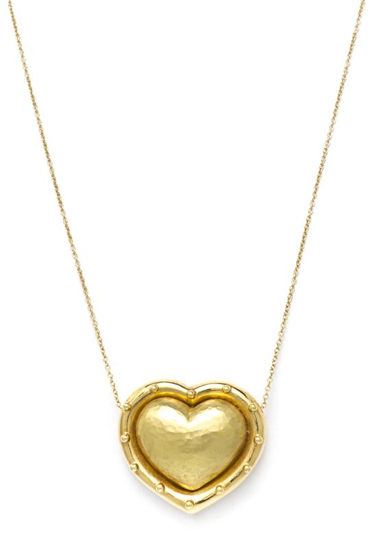 An 18 Karat Yellow Gold Puffed Heart