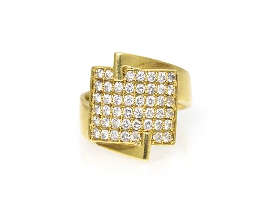 An 18 Karat Yellow Gold and Diamond