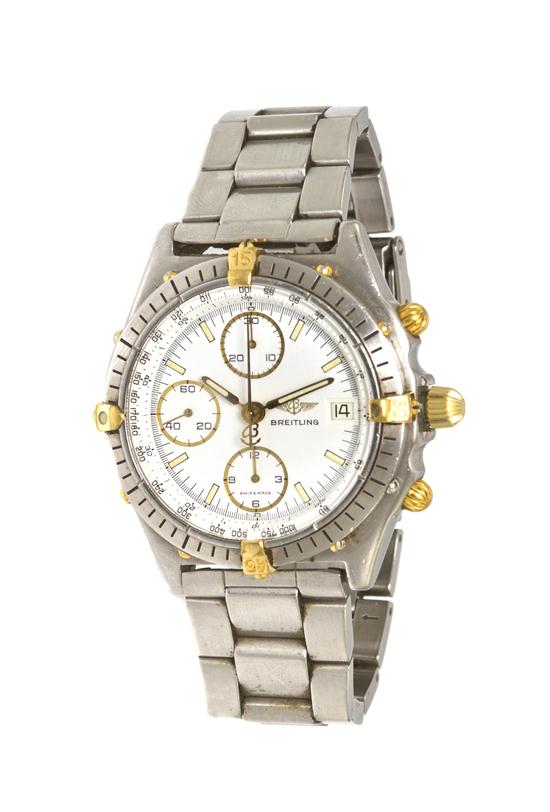 *A Stainless Steel and 18 Karat Yellow