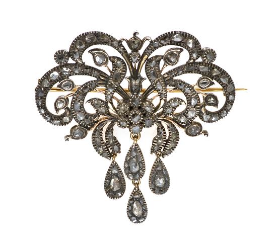 A Silver Topped Gold and Diamond Brooch