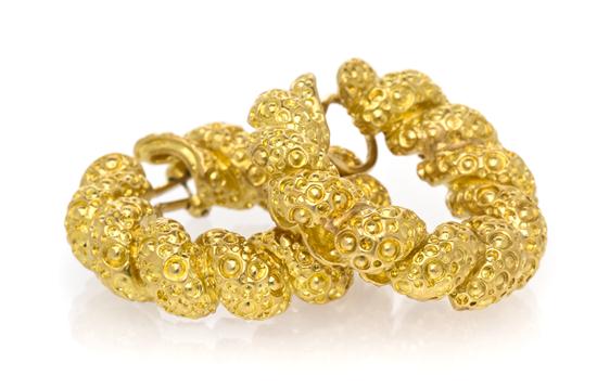 *A Pair of 18 Karat Yellow Gold