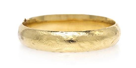 A 14 Karat Yellow Gold Bangle Bracelet