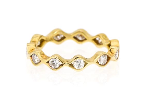 An 18 Karat Yellow Gold and Diamond