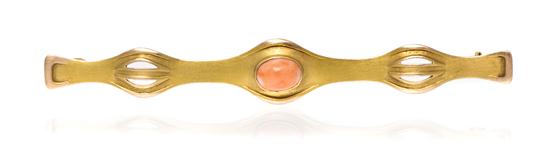 *A 14 Karat Yellow Gold and Coral