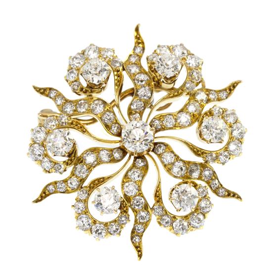 An 18 Karat Yellow Gold and Diamond