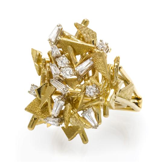 An 18 Karat Yellow Gold and Diamond