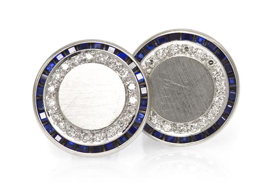 A Pair of 14 Karat White Gold Diamond